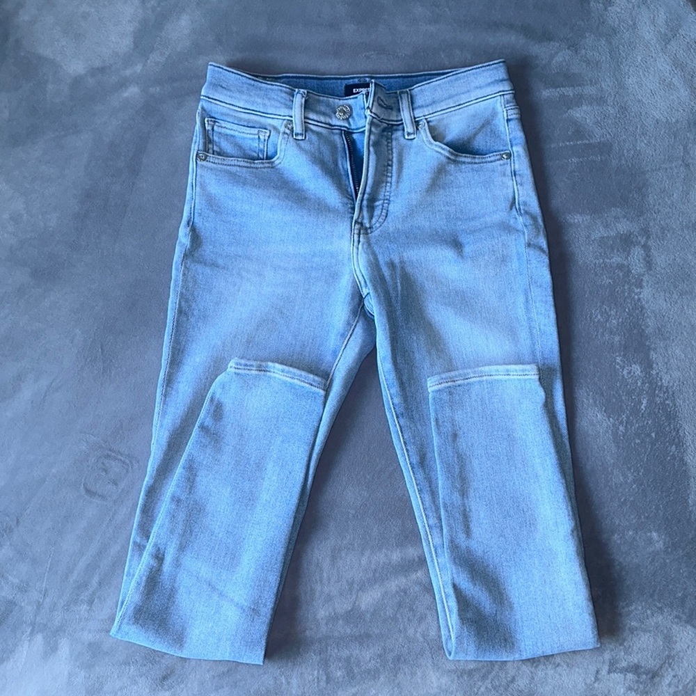 Express light wash skinny mid rise jeans